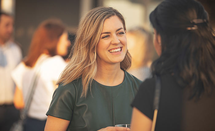 Women at a Networking Event